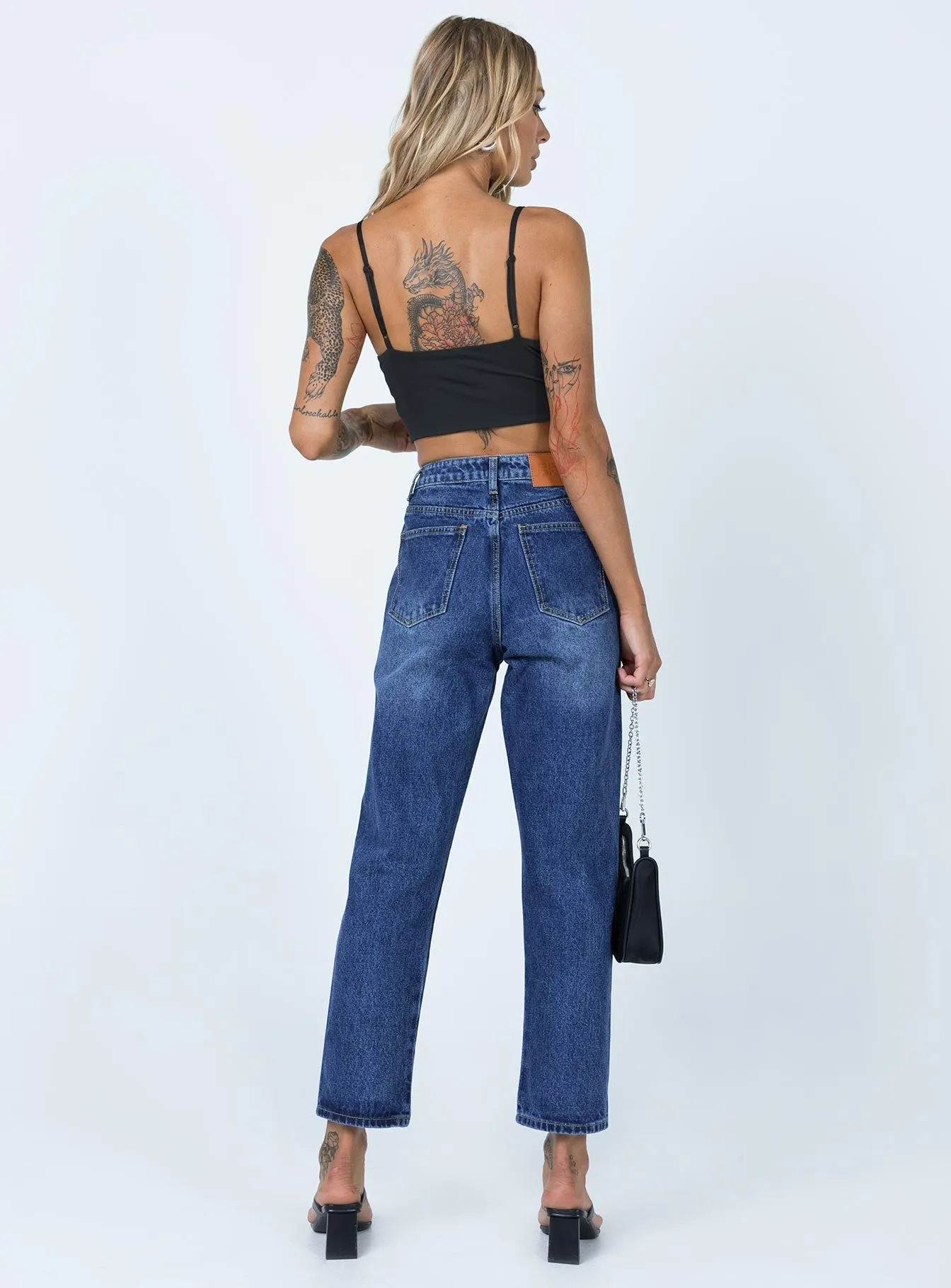 SustainableTextiles Asymmetric Exposed Button Fly Mid Wash Mom Jeans
